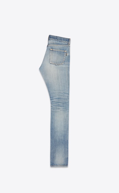 Slim jeans with holes in faded medium blue denim